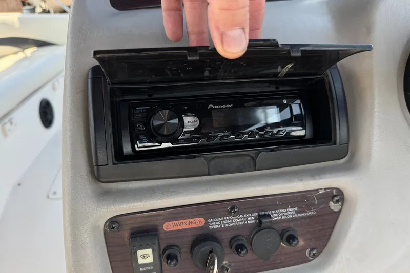 Slide: The Image of Dashboard of a 2004 Chaparral Sunesta 212 with a Pioneer stereo system. - 28