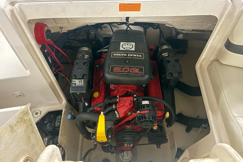 Slide: The Image of 2004 Chaparral Sunesta 212 boat engine compartment with Volvo Penta 5.0GL engine. - 23