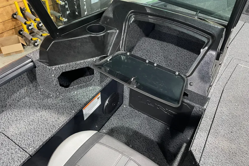 Slide: The Image of Interior of 2027 Lund 1700 Adventure Sport boat with open storage compartment. - 19