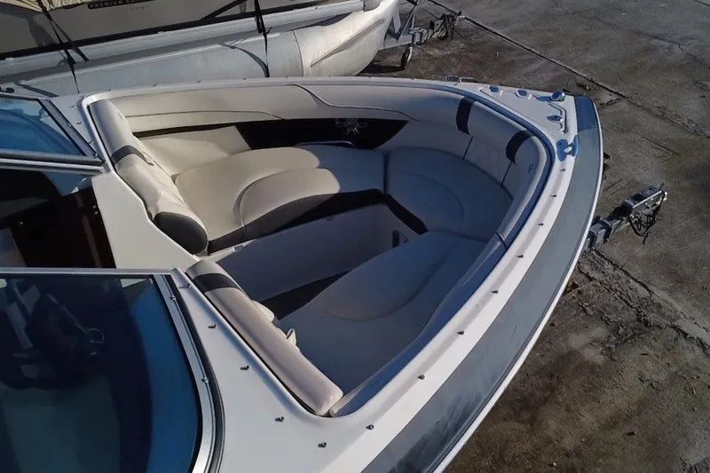 Slide: The Image of 2018 Regal 2300 Bowrider boat with spacious seating and sleek design. - 13