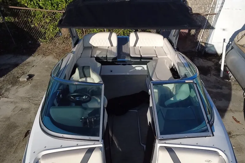 Slide: The Image of 2018 Regal 2300 Bowrider boat with spacious seating and sleek design. - 20