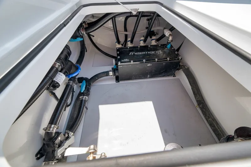 Slide: The Image of Freeman 42LR 2026 boat compartment with hoses and equipment. - 67