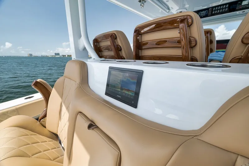Slide: The Image of Luxurious interior of 2026 Freeman 42LR boat with leather seating and digital display. - 78