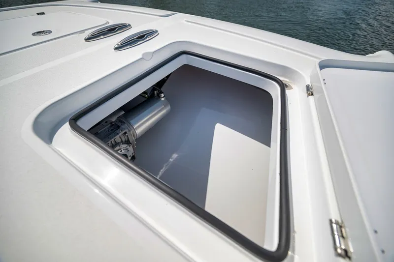 Slide: The Image of Open storage compartment on 2026 Freeman 42LR boat, showcasing interior details. - 37