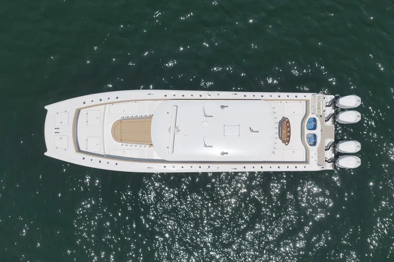 Slide: The Image of Aerial view of 2026 Freeman 42LR boat on sparkling water. - 34
