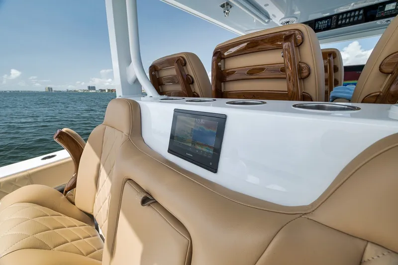 Slide: The Image of Luxurious interior of 2026 Freeman 42LR boat with leather seating and digital display. - 79