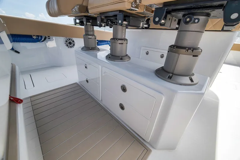 Slide: The Image of Freeman 42LR 2026 boat interior with storage drawers and seating mounts. - 81