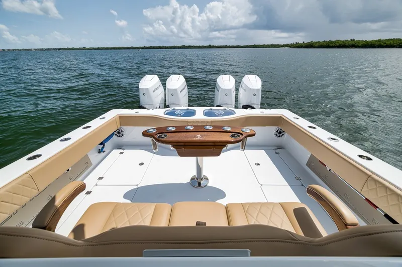 Slide: The Image of Luxurious 2026 Freeman 42LR boat interior with quad engines on open water. - 71