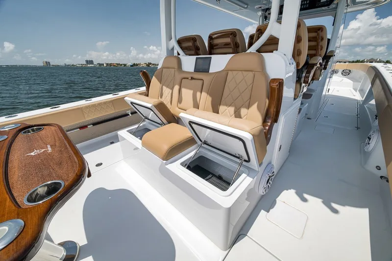 Slide: The Image of Luxury seating on a 2026 Freeman 42LR boat with ocean view. - 77