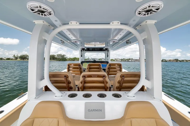 Slide: The Image of Interior view of 2026 Freeman 42LR boat with luxurious seating and Garmin equipment. - 94