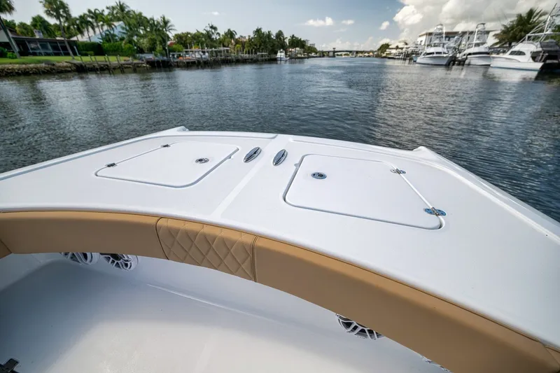 Slide: The Image of Bow view of 2026 Freeman 42LR boat on a calm waterway. - 38