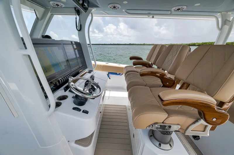 Slide: The Image of Luxurious interior of 2026 Freeman 42LR boat with leather seating and advanced navigation system. - 102