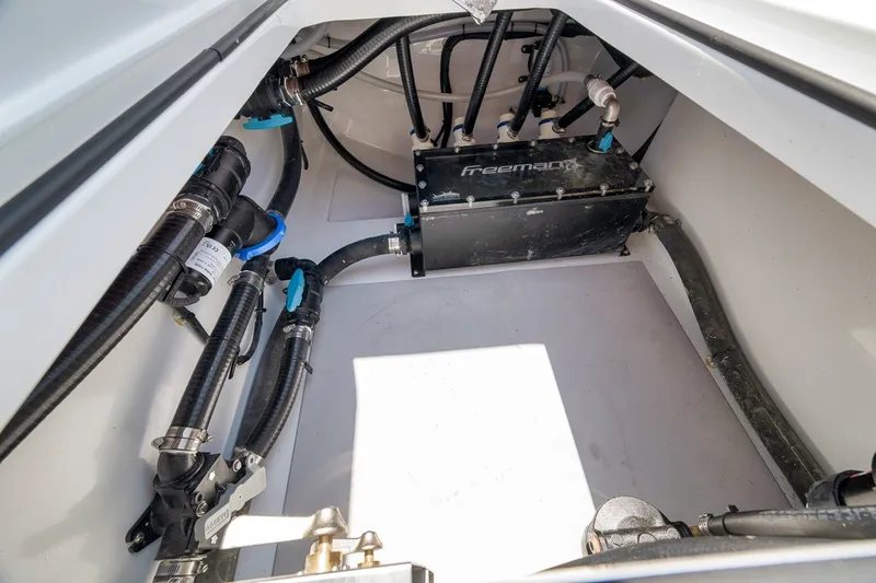 Slide: The Image of Freeman 42LR 2026 boat interior showing plumbing and mechanical components. - 68