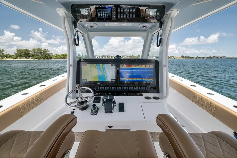 Slide: The Image of Interior view of 2026 Freeman 42LR boat with advanced navigation system and luxurious seating. - 108