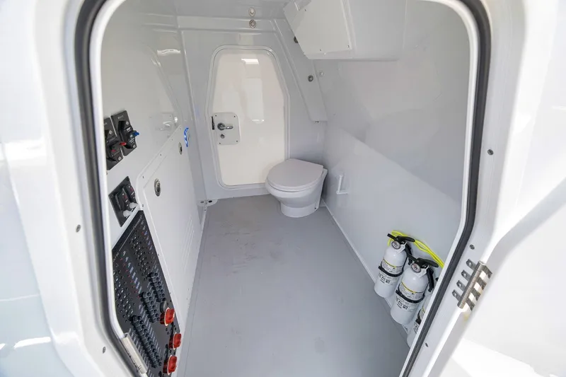 Slide: The Image of Interior of 2026 Freeman 42LR boat with toilet and safety equipment. - 115