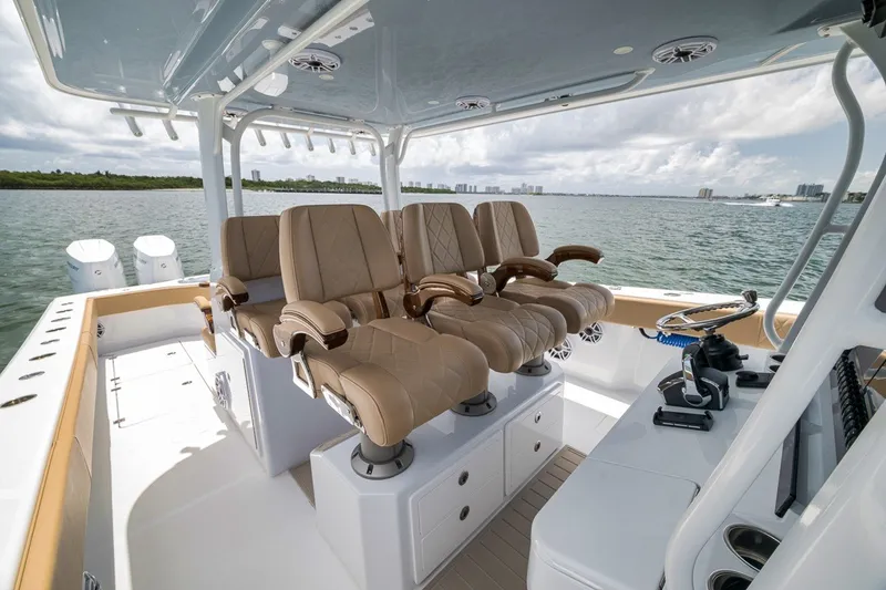 Slide: The Image of Luxurious interior of 2026 Freeman 42LR boat with plush seating and modern controls. - 110