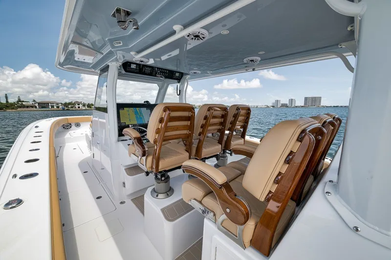 Slide: The Image of Luxurious 2026 Freeman 42LR boat interior with plush seating and advanced navigation system. - 96