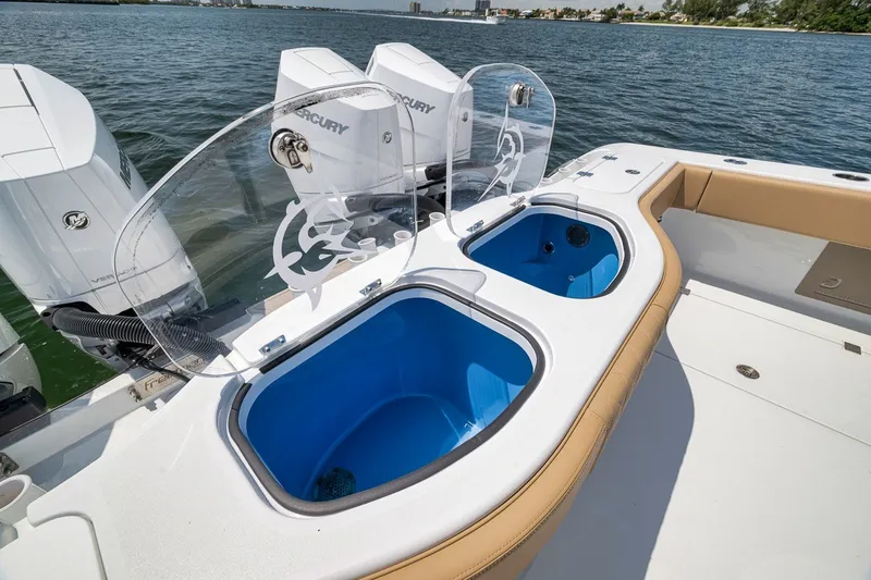 Slide: The Image of Fishing boat deck with live wells and Mercury engines, Freeman 42LR, 2026 model. - 64