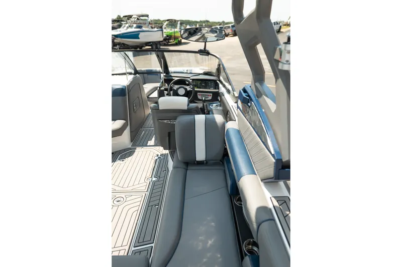 Slide: The Image of 2019 Nautique Super Air Nautique G23 interior with sleek seating and modern dashboard. - 21