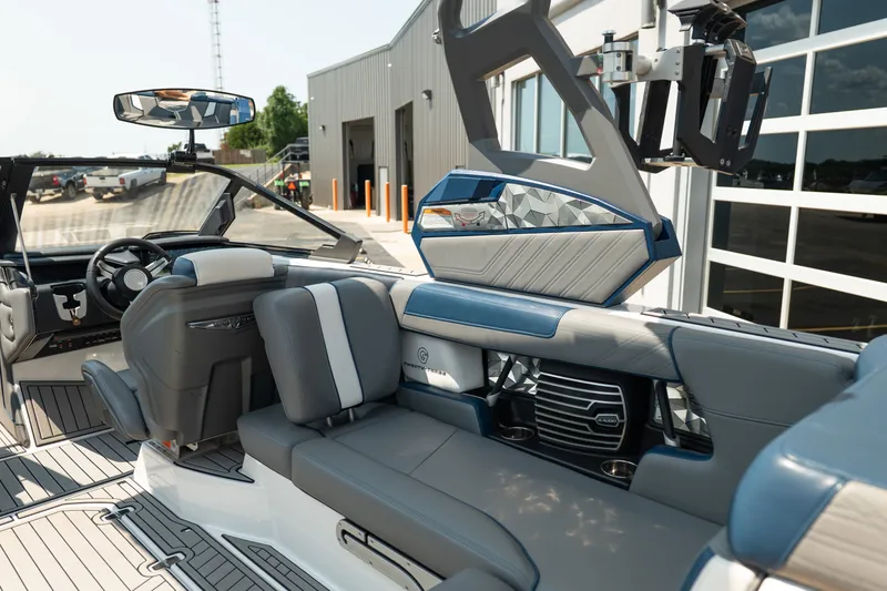 Slide: The Image of 2019 Nautique Super Air Nautique G23 interior with luxurious seating and modern design. - 24
