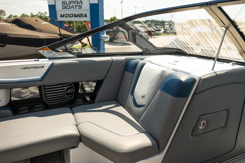 Slide: The Image of Interior of 2019 Nautique Super Air Nautique G23 boat with luxurious seating and modern design. - 36