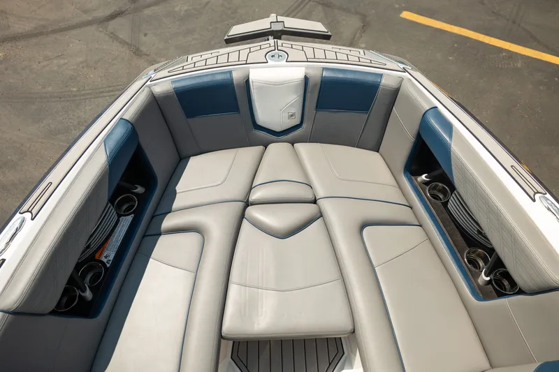 Slide: The Image of Luxurious interior of 2019 Nautique Super Air Nautique G23 boat with plush seating. - 42