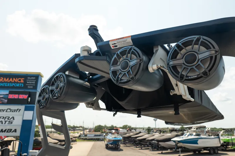 Slide: The Image of 2019 Nautique Super Air Nautique G23 boat speakers at a dealership display. - 20
