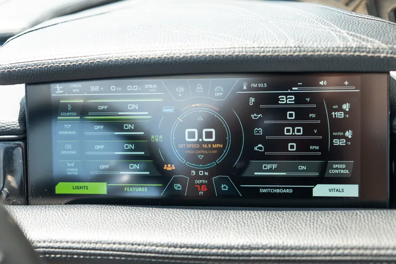 Slide: The Image of Dashboard display of a 2019 Nautique Super Air Nautique G23 boat showing controls and metrics. - 35