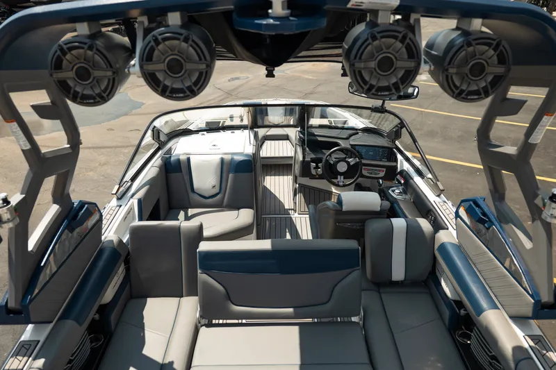 Slide: The Image of 2019 Nautique Super Air Nautique G23 interior with premium seating and advanced audio system. - 25