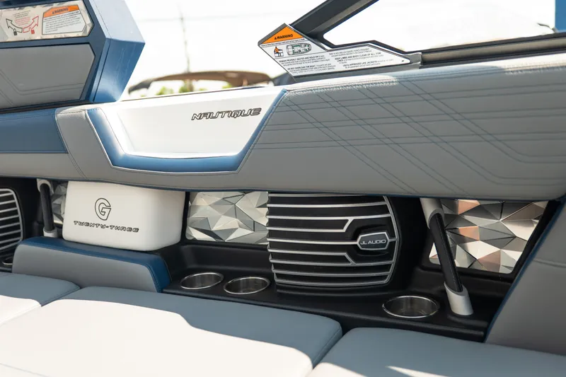 Slide: The Image of Interior of 2019 Nautique Super Air Nautique G23 with JL Audio speakers and stylish design. - 37