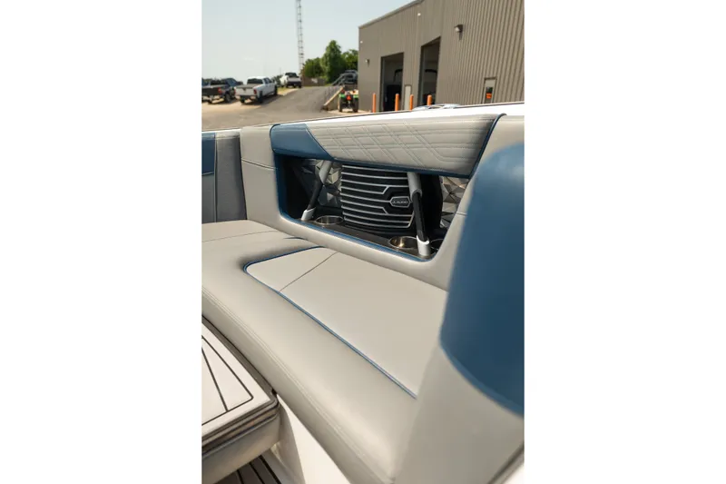 Slide: The Image of 2019 Nautique Super Air Nautique G23 interior with blue and gray seating detail. - 40