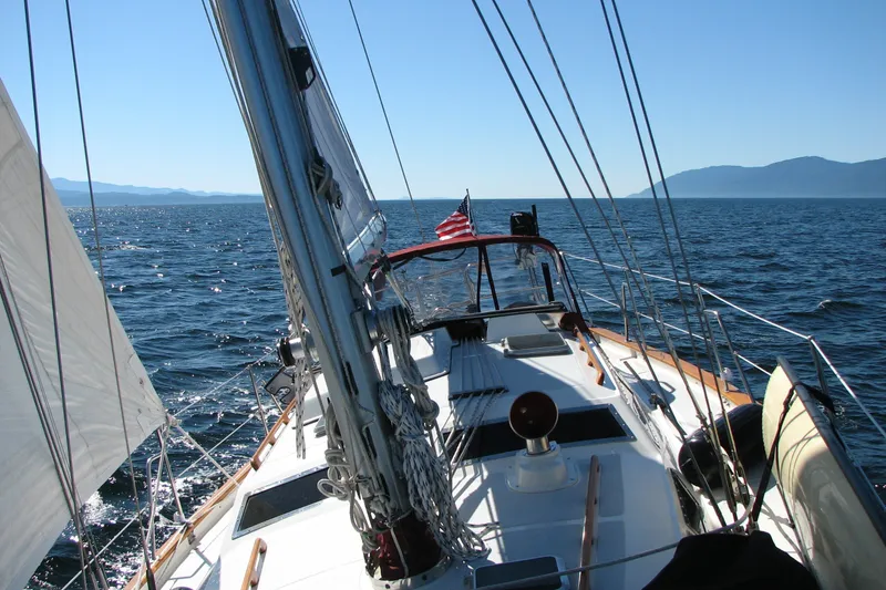 Slide: The Image of Sailing on a 1989 Fair Weather Mariner 39 yacht in open sea under clear skies. - 13