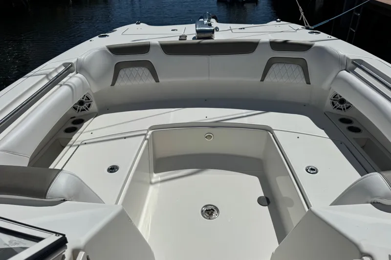Slide: The Image of Interior view of 2022 World Cat 296 DC boat, featuring spacious seating and modern design. - 22