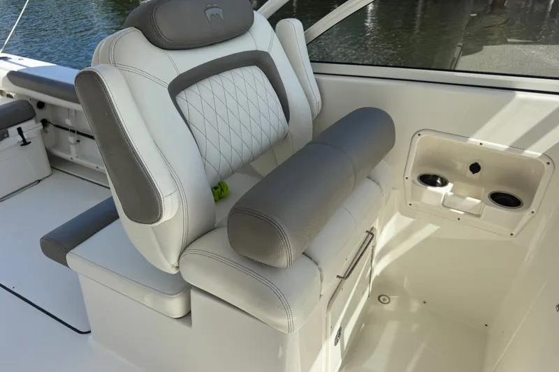Slide: The Image of Luxurious seating on 2022 World Cat 296 DC boat, featuring elegant design and comfort. - 12