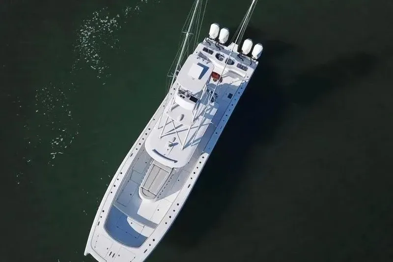 Slide: The Image of Aerial view of 2023 Freeman 47 boat on calm water. - 7