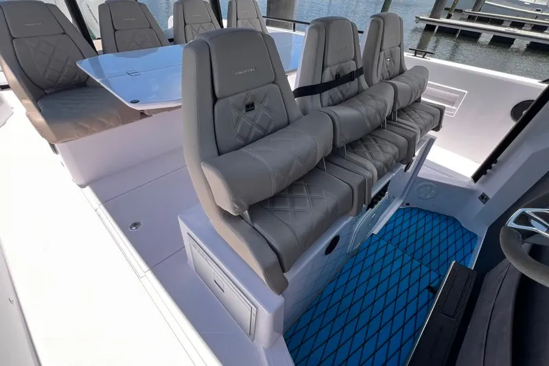 Slide: The Image of Luxurious seating on 2023 Axopar Brabus 37 Sun-Top boat, featuring elegant design and comfort. - 41