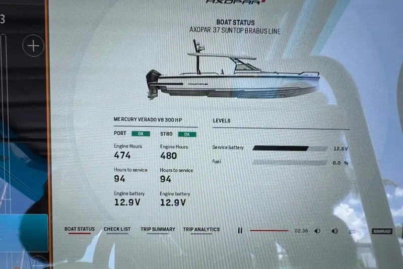 Slide: The Image of Display screen of 2023 Axopar Brabus 37 Sun-Top showing engine and battery status. - 69