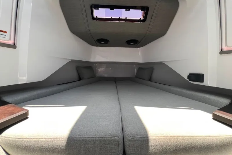 Slide: The Image of Interior cabin of 2023 Axopar Brabus 37 Sun-Top with comfortable seating and modern design. - 15