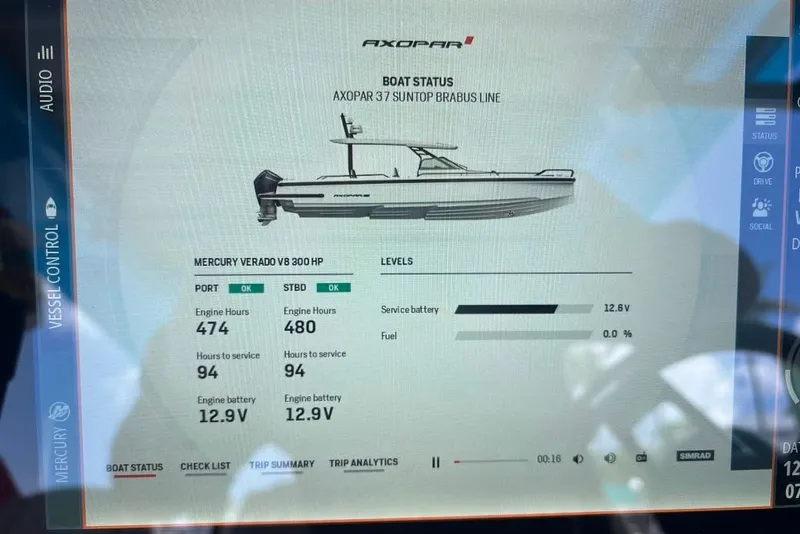 Slide: The Image of Display screen showing 2023 Axopar Brabus 37 Sun-Top boat status and engine details. - 68