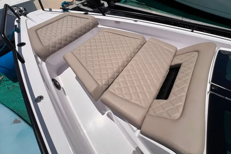 Slide: The Image of Luxurious seating on 2023 Axopar Brabus 37 Sun-Top boat with diamond-stitched upholstery. - 65
