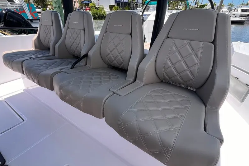Slide: The Image of Luxurious seating on the 2023 Axopar Brabus 37 Sun-Top boat, featuring elegant diamond stitching. - 46