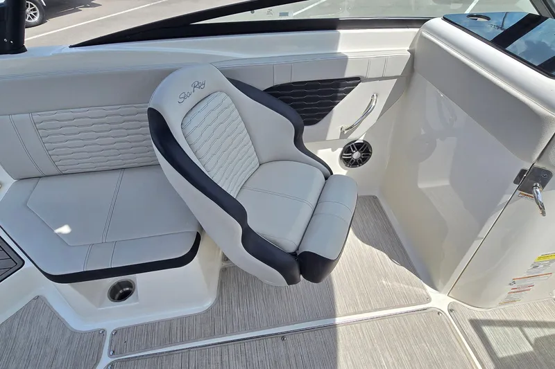 Slide: The Image of 2023 Sea Ray SPX 230 boat interior with luxurious seating and modern design. - 10