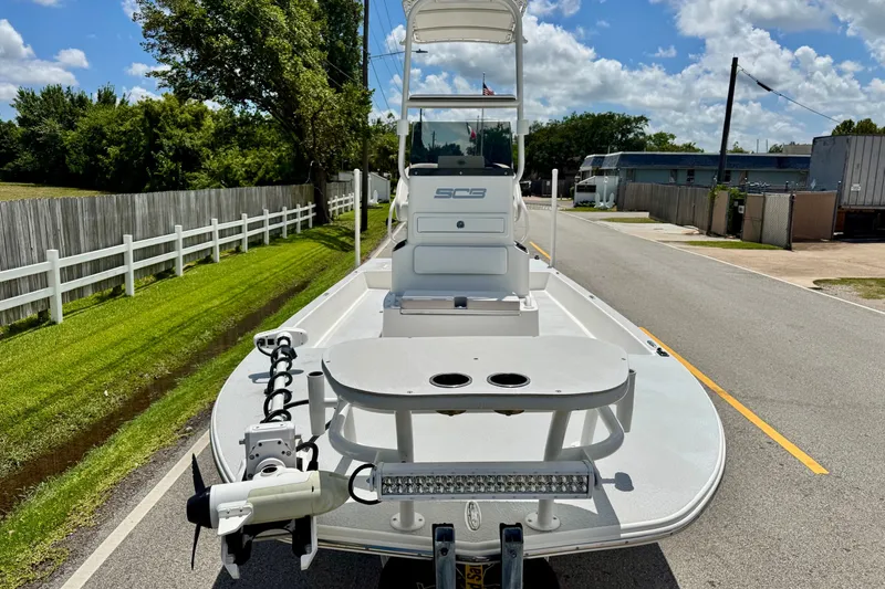 Slide: The Image of 2021 SCB R24 boat on road, featuring sleek design and advanced equipment. - 6