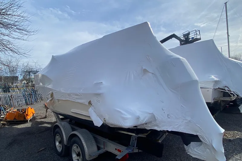 Slide: The Image of Covered 2008 Scout 222 Abaco boat on trailer, outdoor storage. - 6