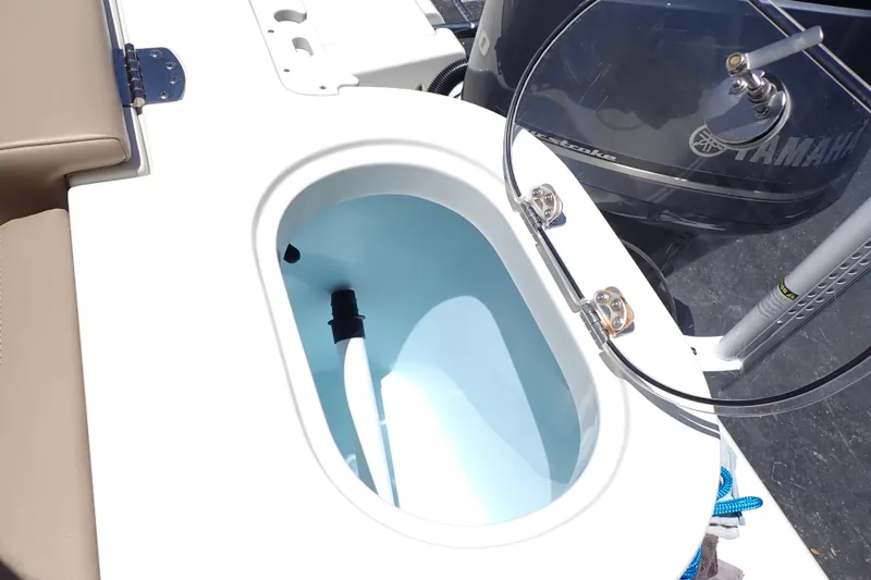 Slide: The Image of Livewell on 2019 Sailfish 245 DC boat with Yamaha outboard motor. - 78