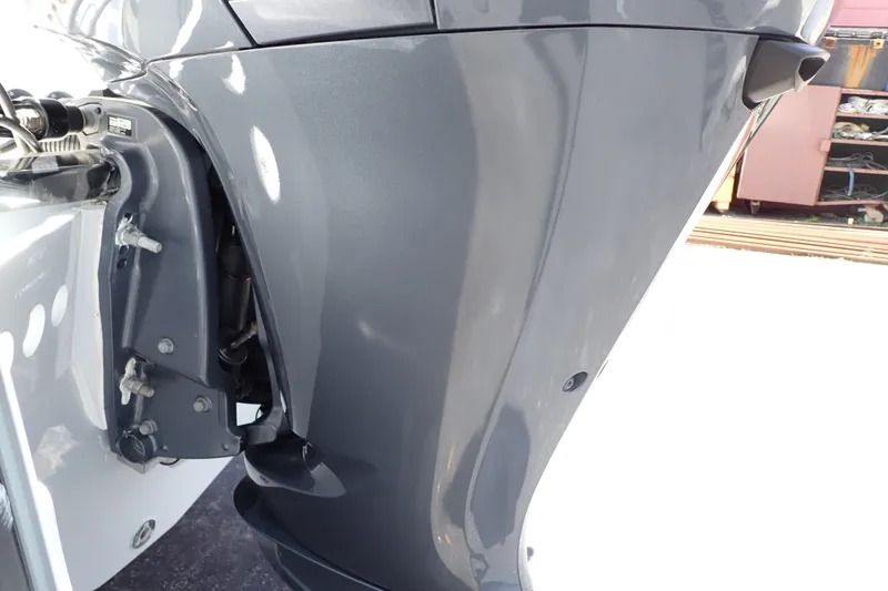 Slide: The Image of 2019 Sailfish 245 DC boat engine close-up, showcasing sleek design and components. - 108