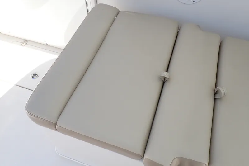 Slide: The Image of 2019 Sailfish 245 DC boat seat with beige upholstery. - 59