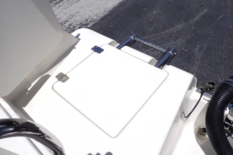 Slide: The Image of 2019 Sailfish 245 DC boat deck with hatch and ladder. - 81