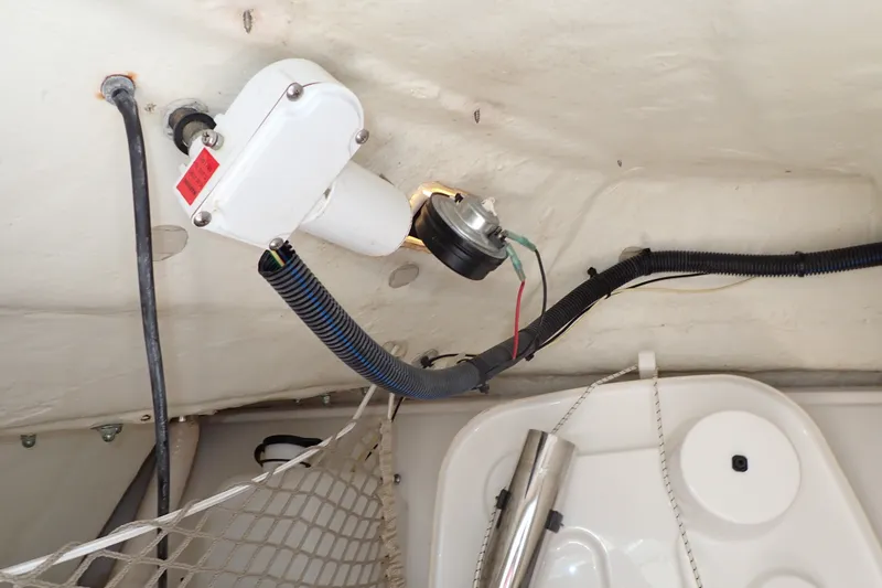 Slide: The Image of Interior wiring and components of a 2019 Sailfish 245 DC boat. - 96