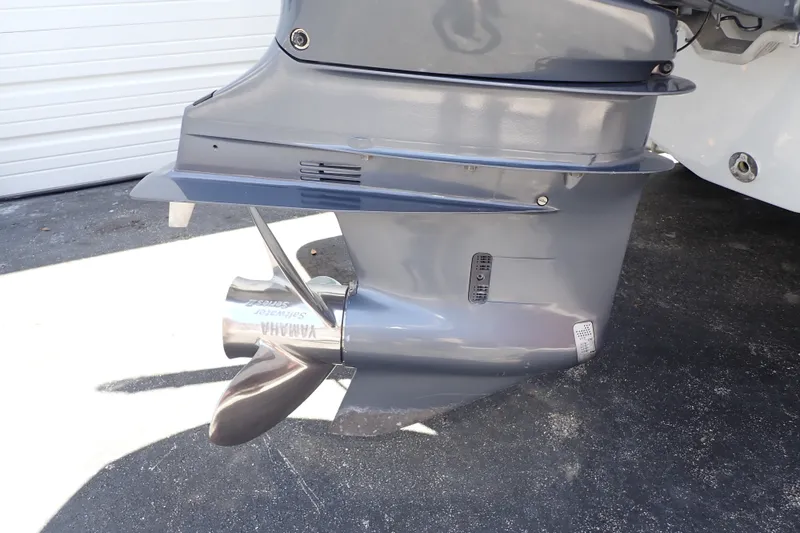 Slide: The Image of 2019 Sailfish 245 DC boat with Yamaha outboard motor propeller. - 106